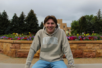 Champion® Distressed Wyoming Arch Reversed Weave Hoodie (143586091167) Champion® Distressed Wyoming Arch Reversed Weave Hoodie